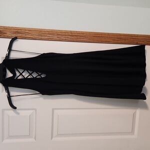 Womens size medium fit and flare dress with criss cross detail, halter style